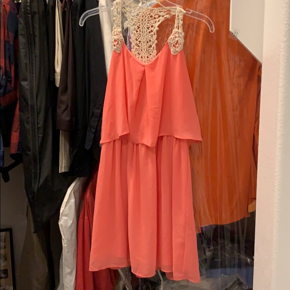 Coral dress with lace detailing